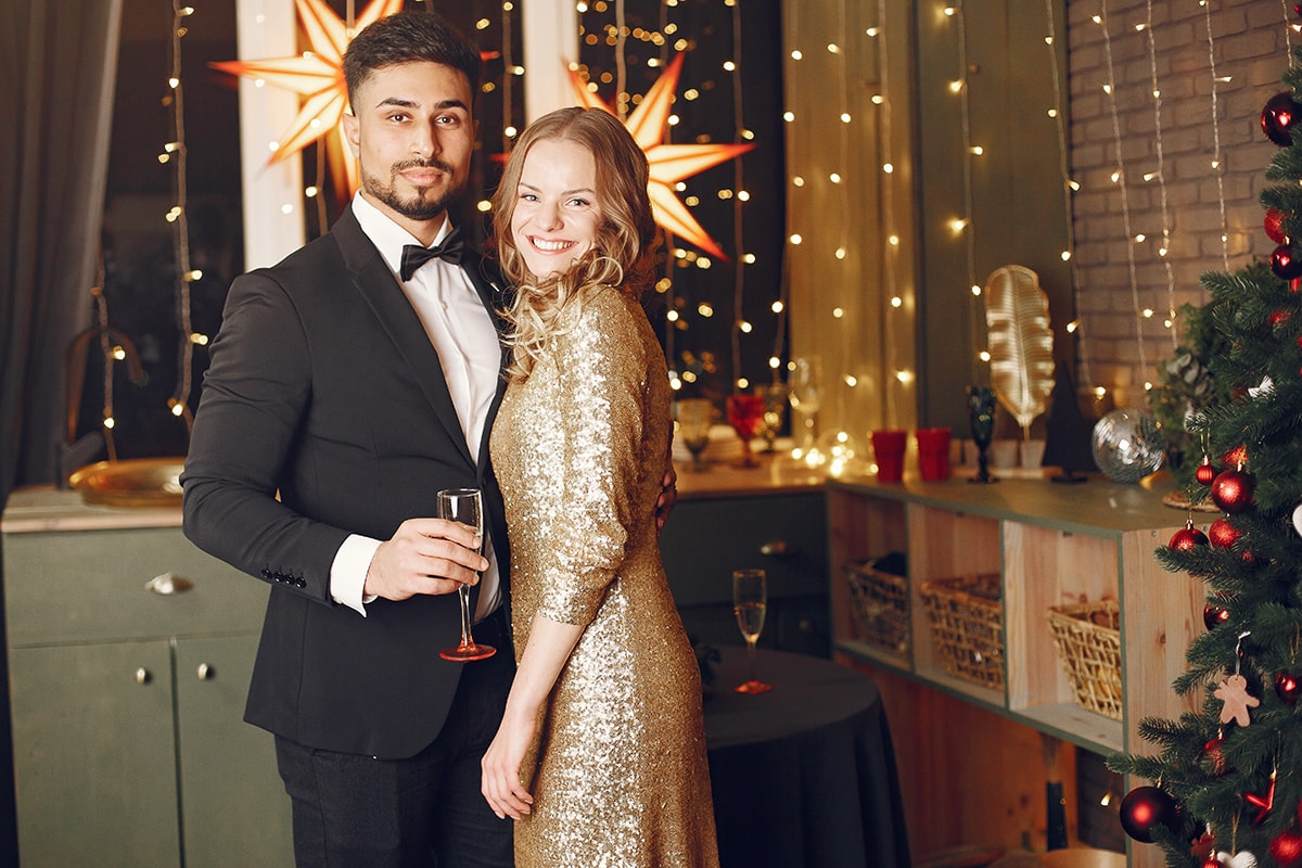 people-christman-decorations-man-black-suit-min